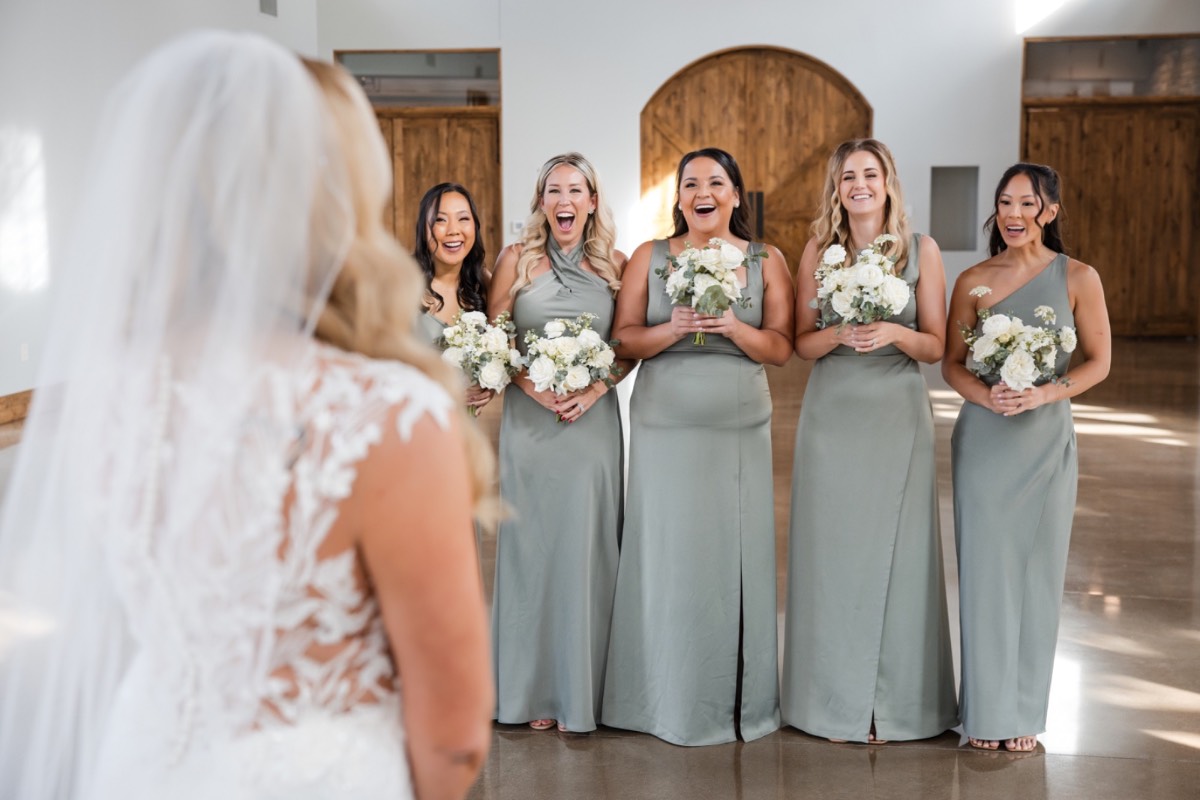 Groom with groomsmen preparing for winter outdoor wedding at Canyonwood Ridge