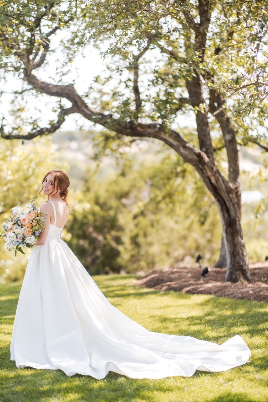 Getting ready moment at Canyonwood Ridge wedding venue in Dripping Springs Texas
