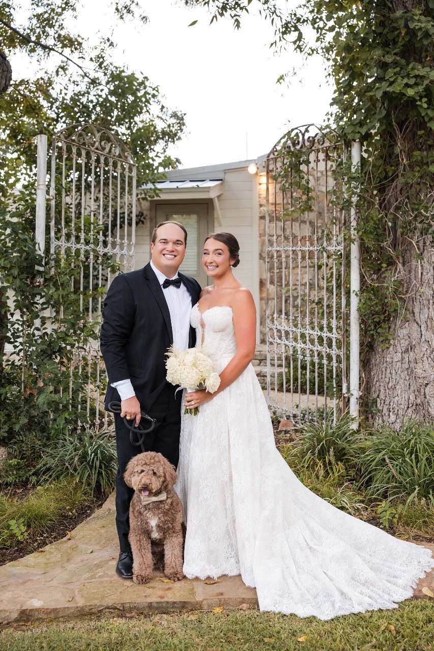 Bride and groom embracing after first look in Austin Texas countryside