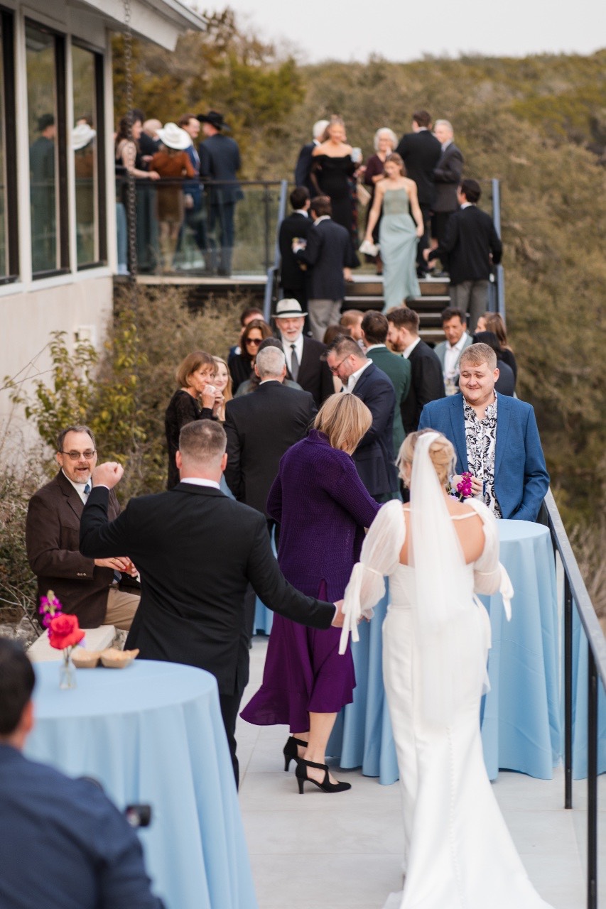 Wedding party dancing together at The Videre Estate Wimberley celebration