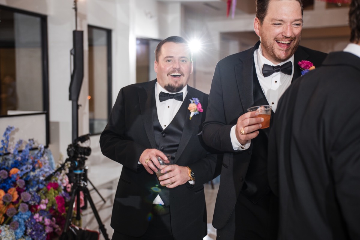Wedding guests celebrating on dance floor at Texas venue party